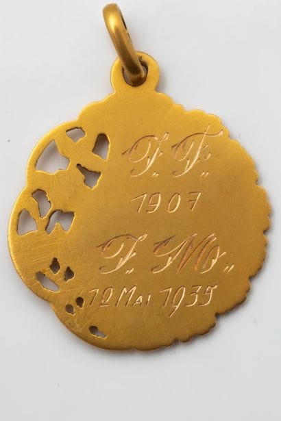 First Communion medal featuring a chalice...