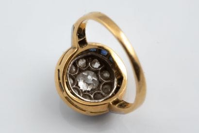 Round ring featuring a center setting of...