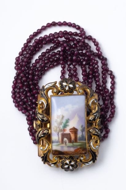 A bracelet with nine rows of garnet beads...