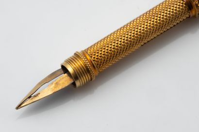 Stylo or jaune (750 millièmes) avec un calendrier...