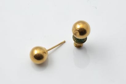 Pair of earrings, each featuring a hollow...