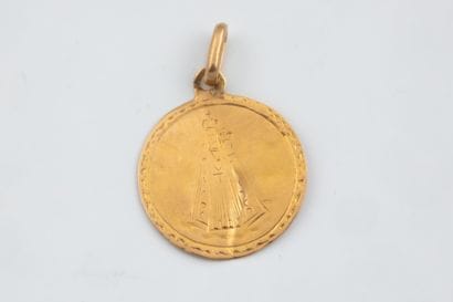 Worn medal depicting the Virgin and Child...