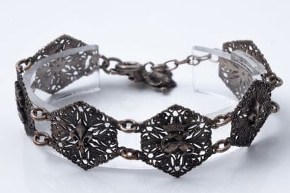 Royalist metal bracelet with openwork hexagonal...