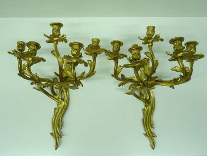 Paire d'appliques en bronze doré éclairant...