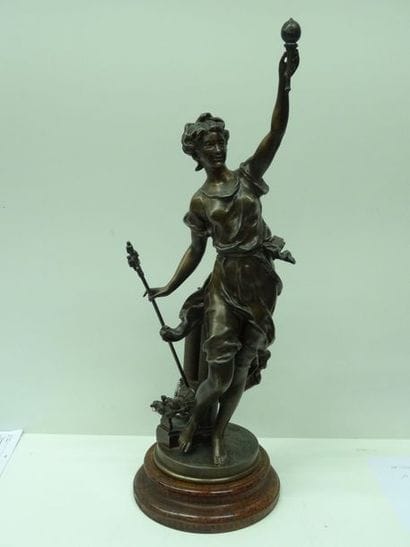 Sculpture porte-torchère en régule à patine...