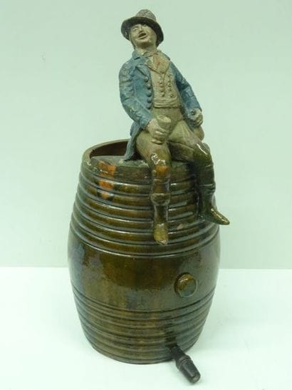 Tonnelet en terre cuite polychrome sur lequel...