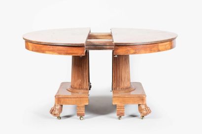 Importante table à bandeau en acajou et placage...