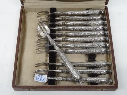 Dans un écrin, suite de 12 fourchettes à...
