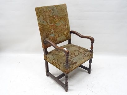 Fauteuil en bois naturel, reposant sur un...