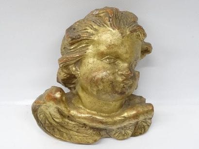 Tête d'amour en bois doré et sculpté. XVIIIe...
