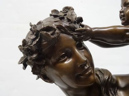 BLANCHARD J. Une femme et un angelot, bronze,...