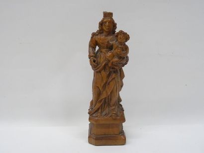 Vierge à l'enfant en bois sculpté. XVIIIe...