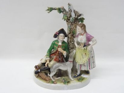 Groupe en porcelaine polychrome représentant...
