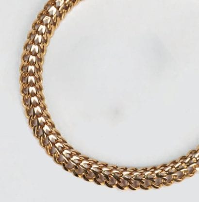 BRACELET gourmette en or rose.