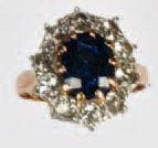 BAGUE marquise en or rose sertie d'un saphir...