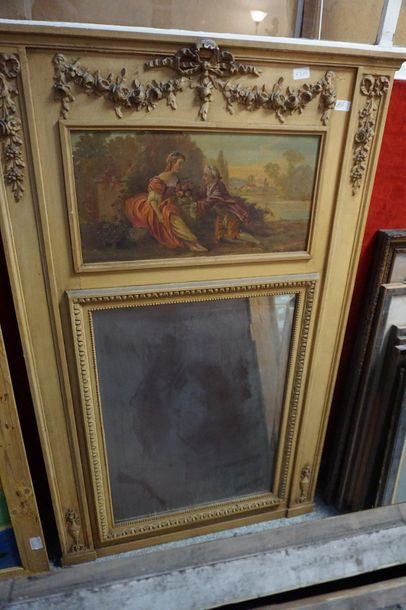 A molded and carved wood trumeau, beige lacquered,...