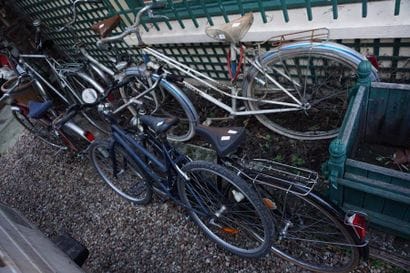Two women's bikes, one black, one white....
