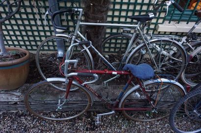 Lot including one Peugeot folding bike, two...