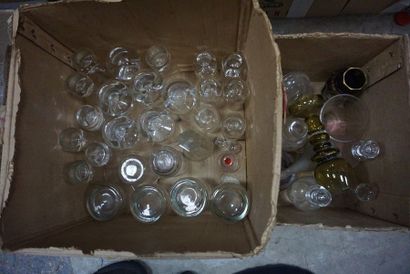 Meeting of glass and crystal bottles and...