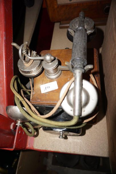 Collection of four antique telephones, two...