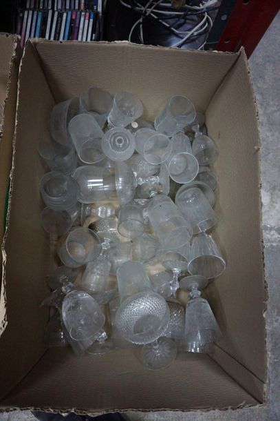 Set of carafes and glass bottles engraved...