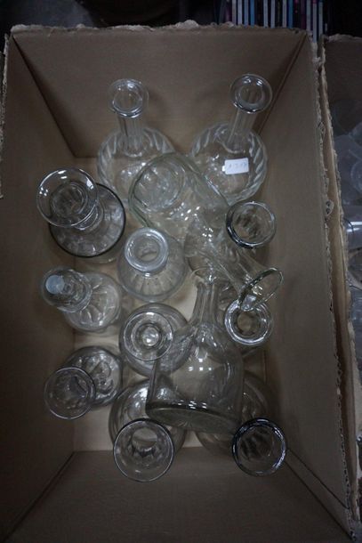 Set of carafes and glass bottles engraved...