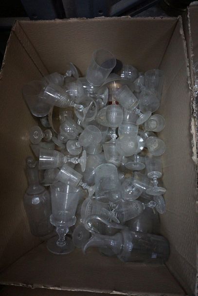 Set of carafes and glass bottles engraved...