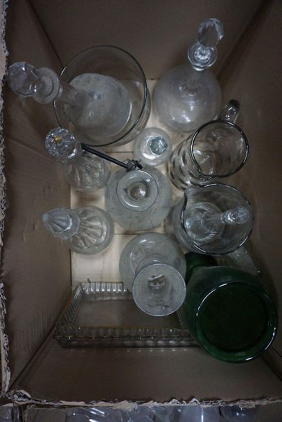 Set of carafes and glass bottles engraved...