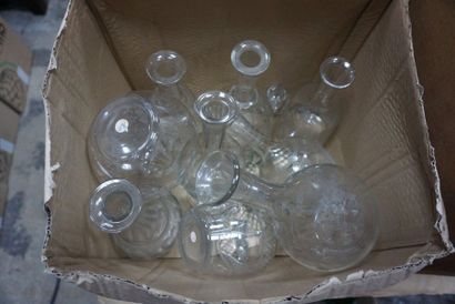 Set of carafes and glass bottles engraved...