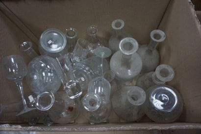 Set of carafes and glass bottles engraved...