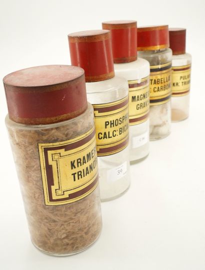 Cinq pots à pharmacie en verre