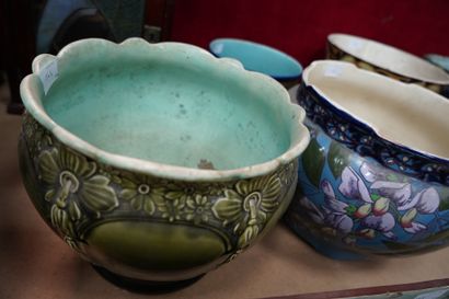 Six cache-pots en céramique émaillée à décor...
