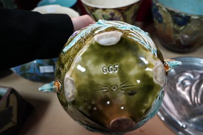 Six cache-pots en céramique émaillée à décor...