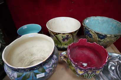Six cache-pots en céramique émaillée à décor...