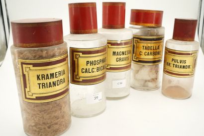 Cinq pots à pharmacie en verre