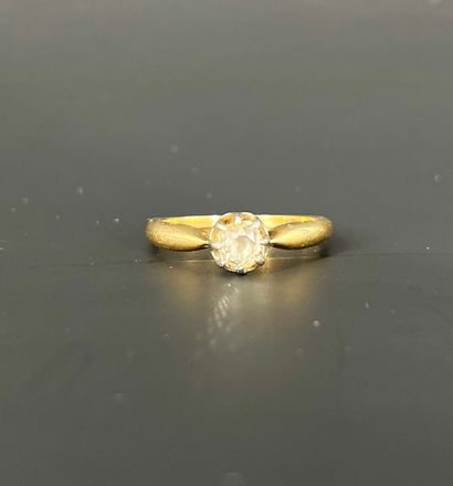 Bague en or 18K (750 millièmes) griffée d'un...
