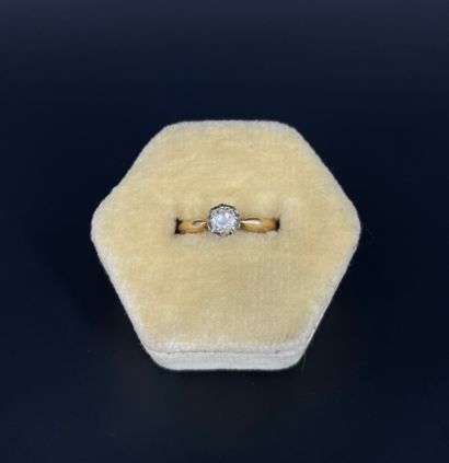 Bague en or 18K (750 millièmes) griffée d'un...