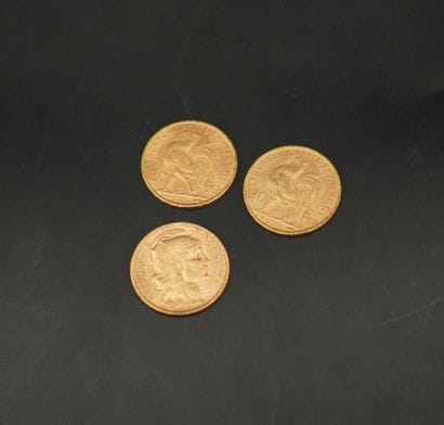 3 pièces de 20 francs or 1906. Poids : 19,3...