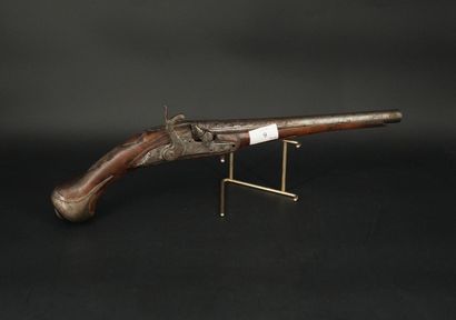 Pistolet à percussion en bois sculpté et...
