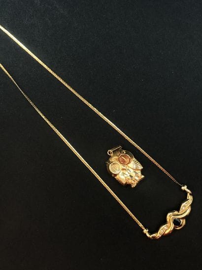 Lot en or 18k (750) comprenant un pendentif...