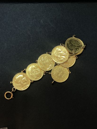 Bracelet composé de 8 pièces en or dont 20...