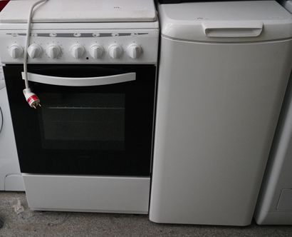 Four PROLINE. On joint un lave-linge. Le...