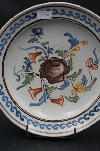 Vron, plat circulaire en faïence émaillée...