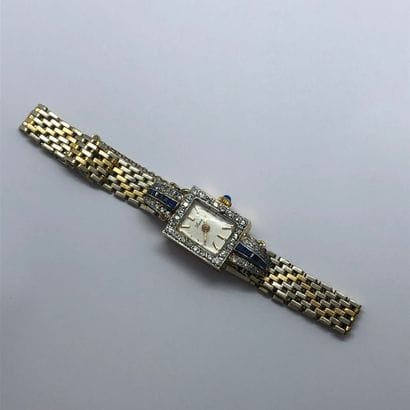 Petite montre bracelet de dame en or 18K...