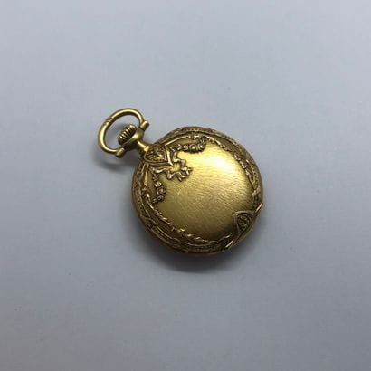 Montre de col en or 18K, le boitier en or...