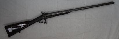 MILITARIA. Fusil à double canon en bois et...