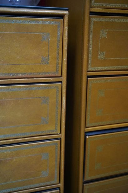 Deux cartonniers gainés de cuir doré aux...
