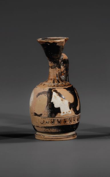 RED-FIGURED ARYBALLISQUE LEKYTHOS
The body...