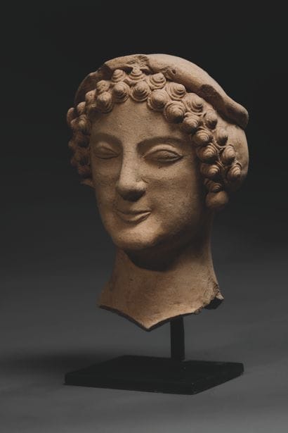 VOTIVE HEAD OF A YOUNG MAN
Sketching an archaic...