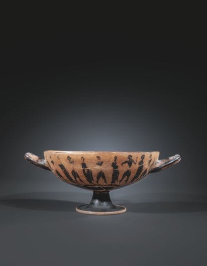 TYPE A BLACK-FIGURE BOWL
The sides are decorated...